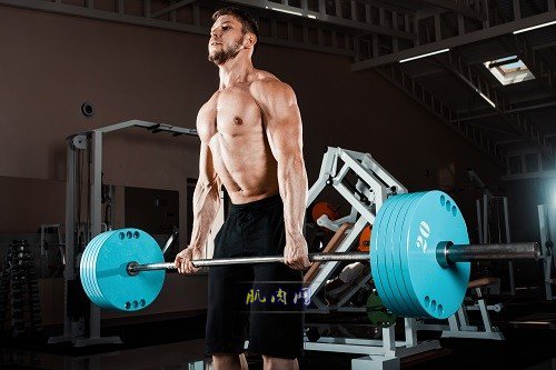 Muscular Man Lifting Deadlift